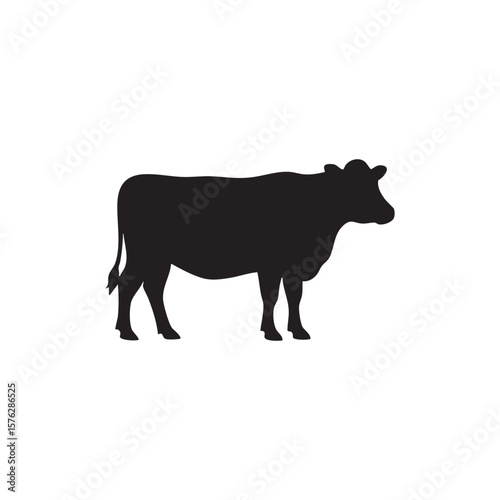 Black silhouette of a cow standing on a white background isolated on white background silhouette