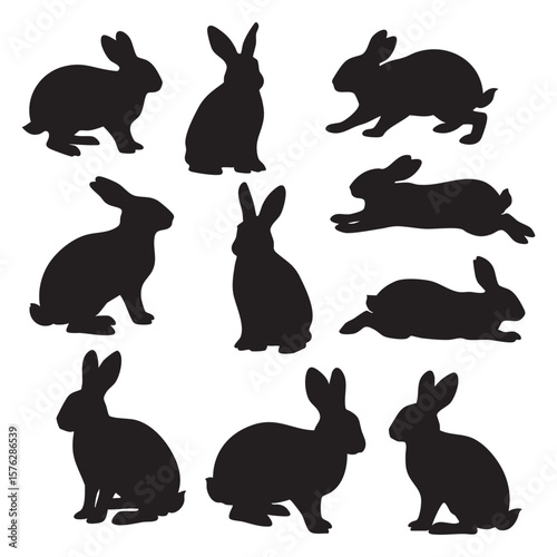 Collection of black rabbit silhouettes in various poses isolated on white background silhouette