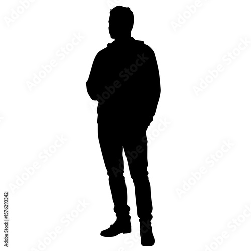 Silhouette of a man standing casually with hands in pockets  