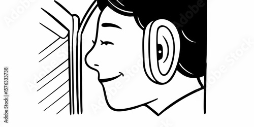 Young woman smiling and listening with headphones by window  