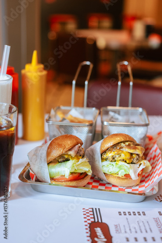 Classic Diner Cheeseburgers with Fries and Drinks