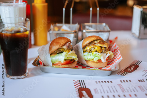 Classic Diner Cheeseburgers with Fries and Drinks