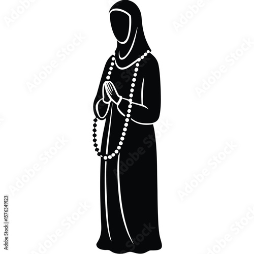 Woman wearing hijab and prayer beads praying with hands together silhouette