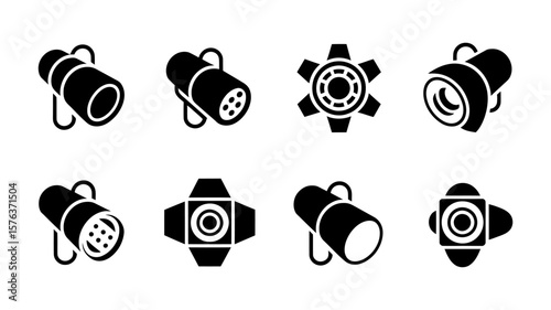 Vector art of a collection of eight diverse spotlight icons representing various lighting equipment for stage and studio