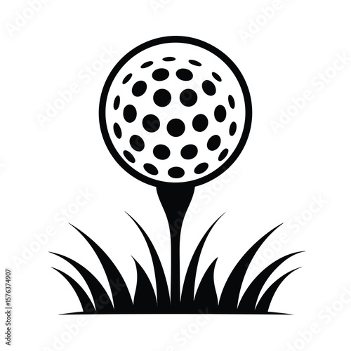 black and white golf ball on tee and grass against 