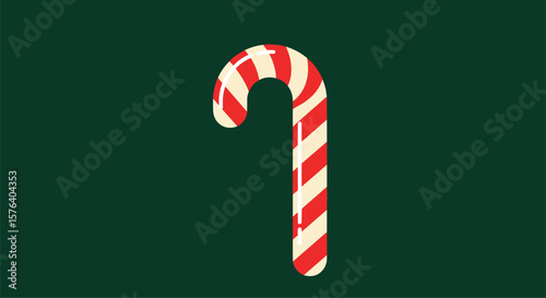 Classic red and white striped candy cane festive holiday treat ornament on a dark green background