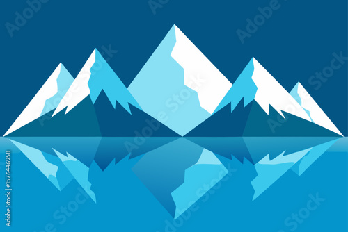 snow capped mountains mirrored in glacier lake 