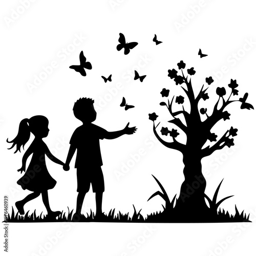 Children reaching for butterflies in a field silhouette