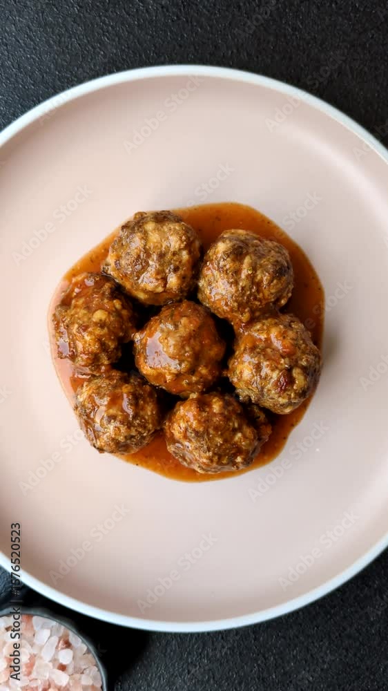 Meat, meatballs in tomato sauce, Italian food, beef or pork with salt and spices. Meatballs with tomatoes as a background for your design Meat, meatballs in tomato sauce, Italian food, beef or pork with salt and spices. Meatballs with tomatoes as a background for your design