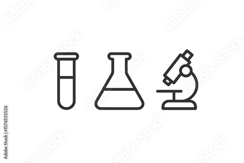 Laboratory equipment including test tubes, flask, and microscope used for scientific research and experiments