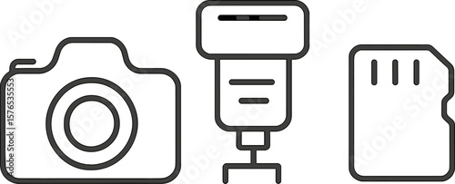 Camera equipment setup with flash and memory card on a clean surface for photography enthusiasts