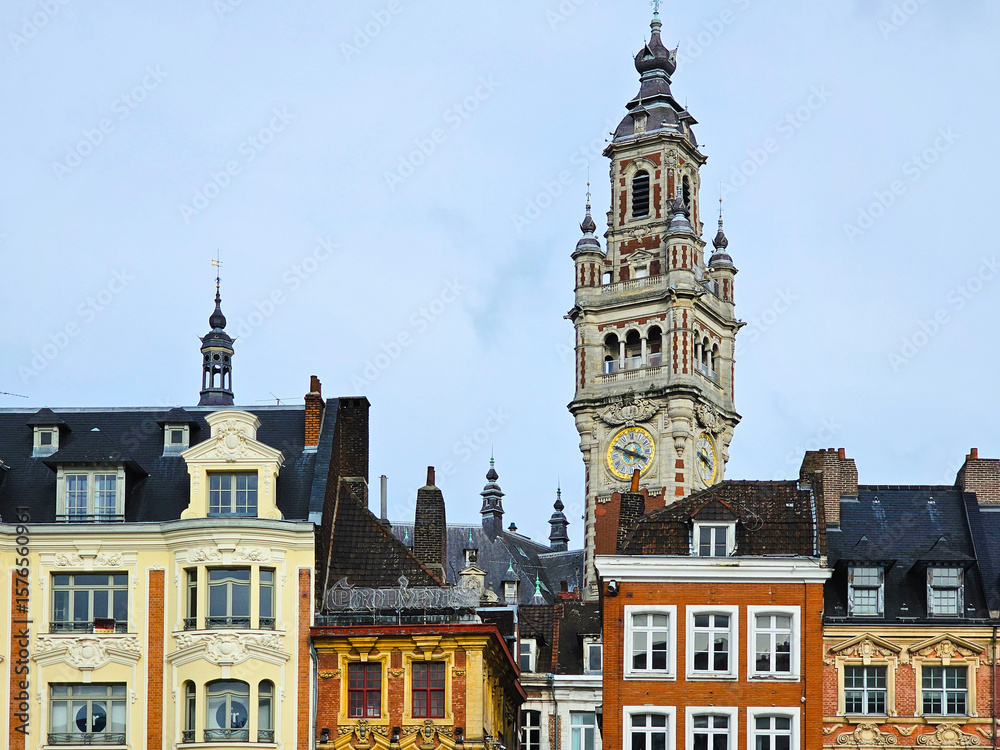 Obraz premium Lille cityscape, La Grand Place square in city center, Flemish mannerist architecture style buildings, bell tower Chamber of Commerce in Lille, France