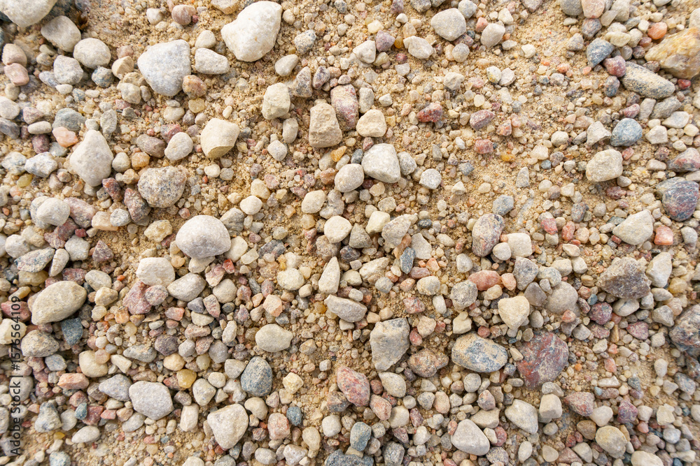Background of small stones on the road. Pebbles on the beach. Background of small stones on the road. Pebbles on the beach.