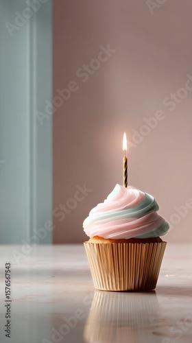Colorful Cupcake With Candle Celebrating a Special Occasion in a Bright Kitchen