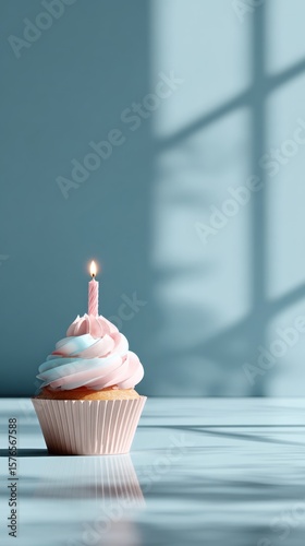 Delicious Cupcake With Mint Frosting and a Lit Candle for a Special Celebration