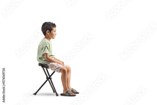 Boy sitting on a portable chair