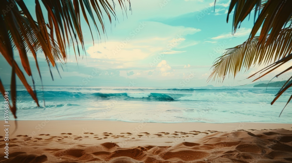 Fototapeta premium Serene beach scene with gentle waves lapping at the shore, framed by lush palm leaves, creating a tranquil atmosphere for relaxation and escape from daily life
