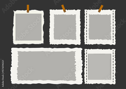 A collection of four different sized photo frames with a brown clip on the top