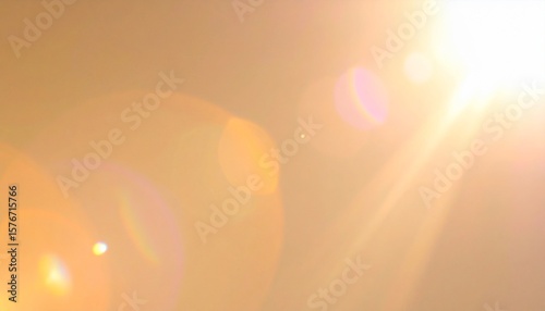 soft vintage light leak in warm tones like orange and amber, perfect for retro cinematic overlays with blurred edges and glowing lens flares.
