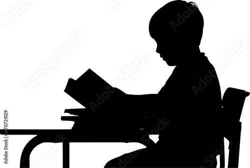 Child reading book silhouette at school desk