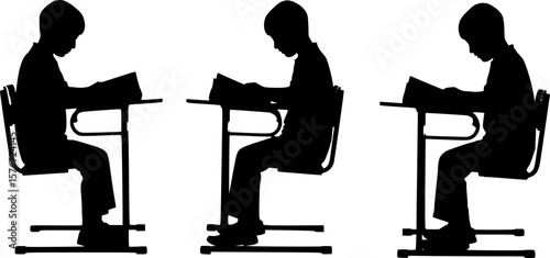 Child reading book silhouette at school desk