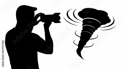 Silhouette of photographer taking picture of tornado with swirling wind in black and white style image