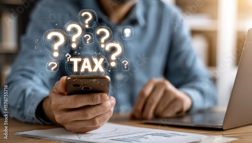 Person holding phone with TAX surrounded by question marks
