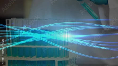 Laboratory technician moving pipette over tube rack with glowing data streams flowing for analysis