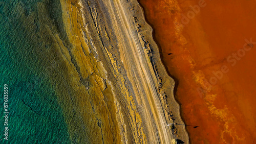 Red salt sea lake, at winter, village Alyki, Boeotia, Greece.