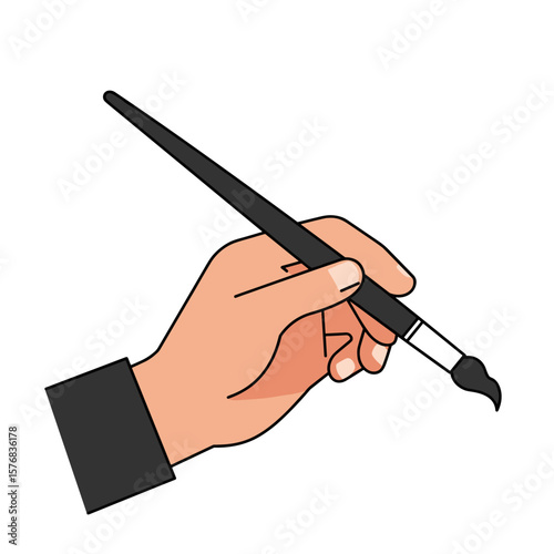 Hand holding a paintbrush in a vertical position for painting  