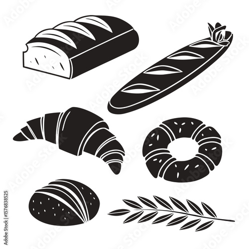 Assortment of baked goods and wheat stalk bread baguette