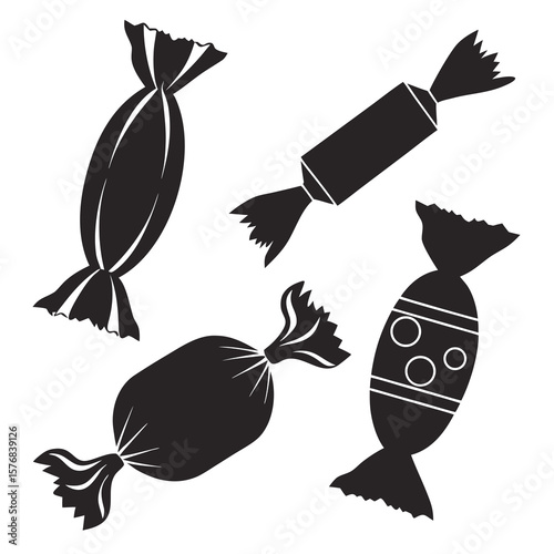 Black candy wrappers with twisted ends and decorative patterns sweets confectionery