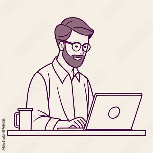 Focused Professional Working on a Laptop with a Coffee Cup Nearby