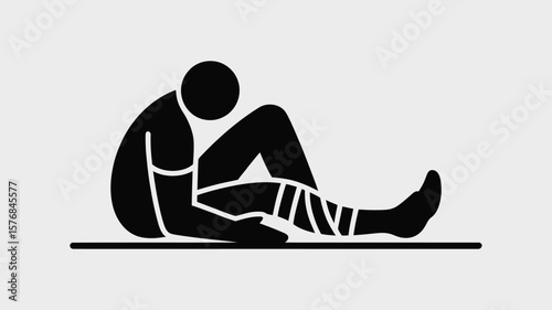 Stylized black silhouette of a person with a bandaged leg sitting down
