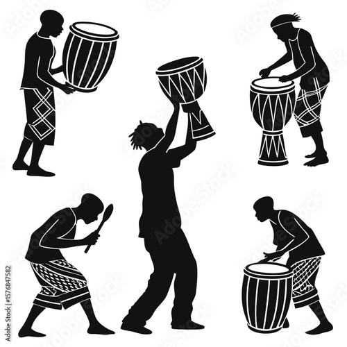 Tribal drummers performing rhythmic music with traditional instruments performance