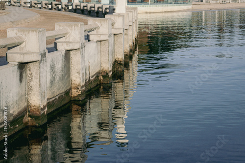 promenade and old pier on the sea