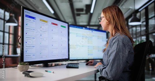 Busy Executive Using Kanban Project Management Software