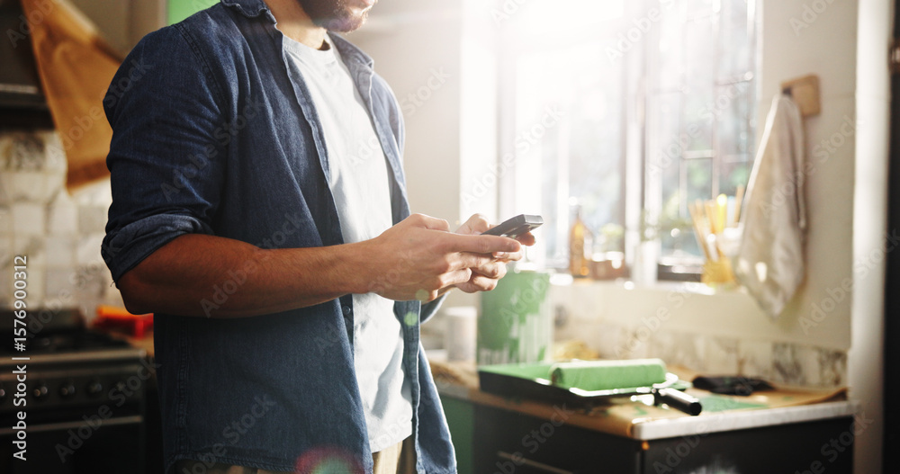 Fototapeta premium DIY, hands and phone with man in kitchen of apartment to search for home improvement ideas. App, maintenance and renovation with homeowner in new house for interior design, online planning or texting