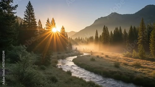 Misty mountain stream at sunrise