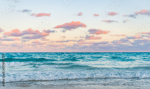 Fototapeta Naklejka Na Ścianę i Meble -  Sea sunset on ocean. Sunset seascape at summer vacation. Sunrise with sea beach. Dramatic sunrise horizon at sea. Romantic summer vacation on sunset seascape. Serene horizon
