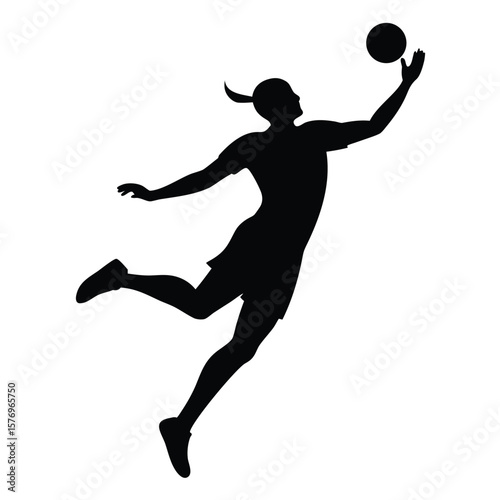 Silhouette of a woman leaping and reaching for a ball during a dynamic sports play