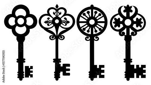 Four antique black keys show unique designs and craftsmanship, silhouette
