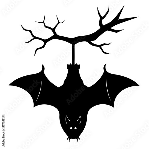Black bat hanging upside down from bare tree branch
