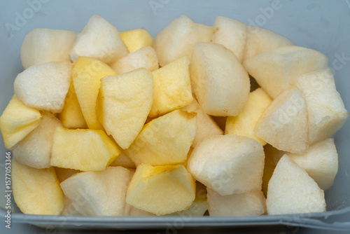 Diced apple pieces are small, cube-shaped cuts of apple. They are fresh, sweet, and slightly tangy. Perfect for healthy snacks, salads, or as an addition to various dishes.