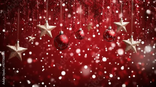 Red ornaments and gold stars hang against a sparkly red backdrop.