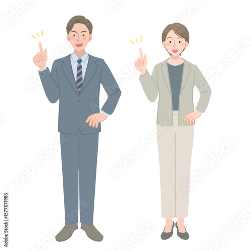指差しをするビジネスマンの男女