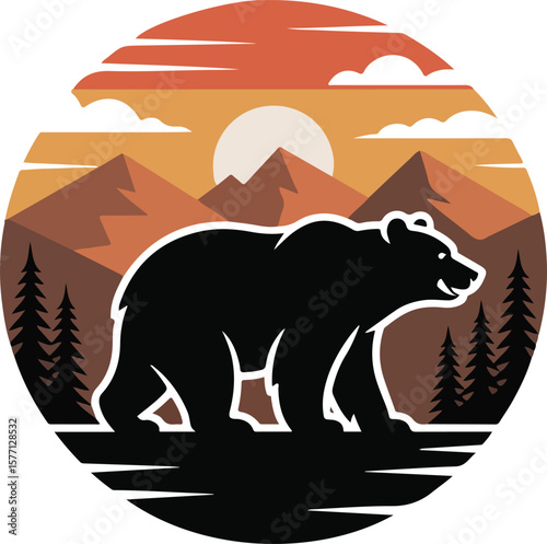 A majestic bear silhouetted against a stunning mountain sunset
