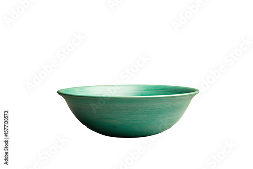 a green bowl sitting on top of a white table