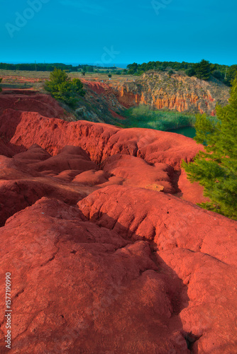 Vibrant colors landscape in the quarry of bauxite near Otranto, Salento, Apulia Region, Italy