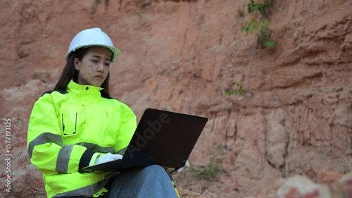 Geologist surveying mine,Explorers collect soil samples to look for minerals.